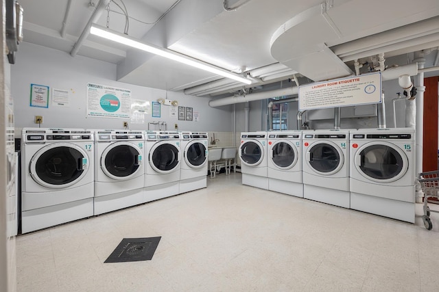 101 Old Mamaroneck Rd Unit 1B1, White Plains, NY 10605 - community laundry room featuring washer and clothes dryer and tile patterned floors
