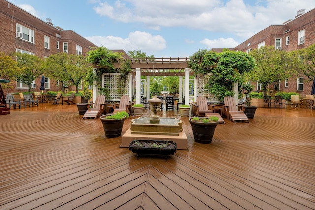 101 Old Mamaroneck Rd Unit 1B1, White Plains, NY 10605 - wooden terrace with a pergola