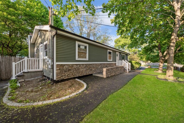 545 Granny Rd, Medford, NY 11763 - view of home's exterior featuring stone siding