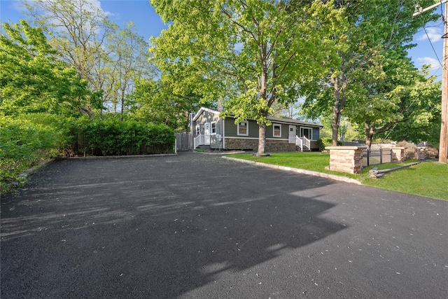 545 Granny Rd, Medford, NY 11763 - view of front of home with driveway and stone siding
