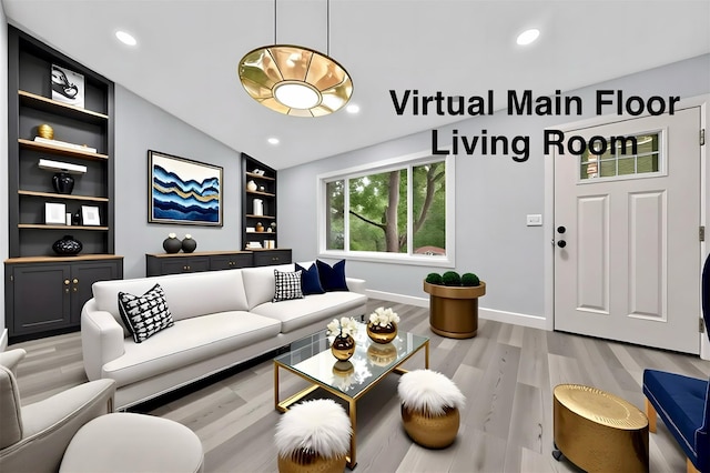 545 Granny Rd, Medford, NY 11763 - living room featuring built in shelves, light wood finished floors, baseboards, recessed lighting, and vaulted ceiling