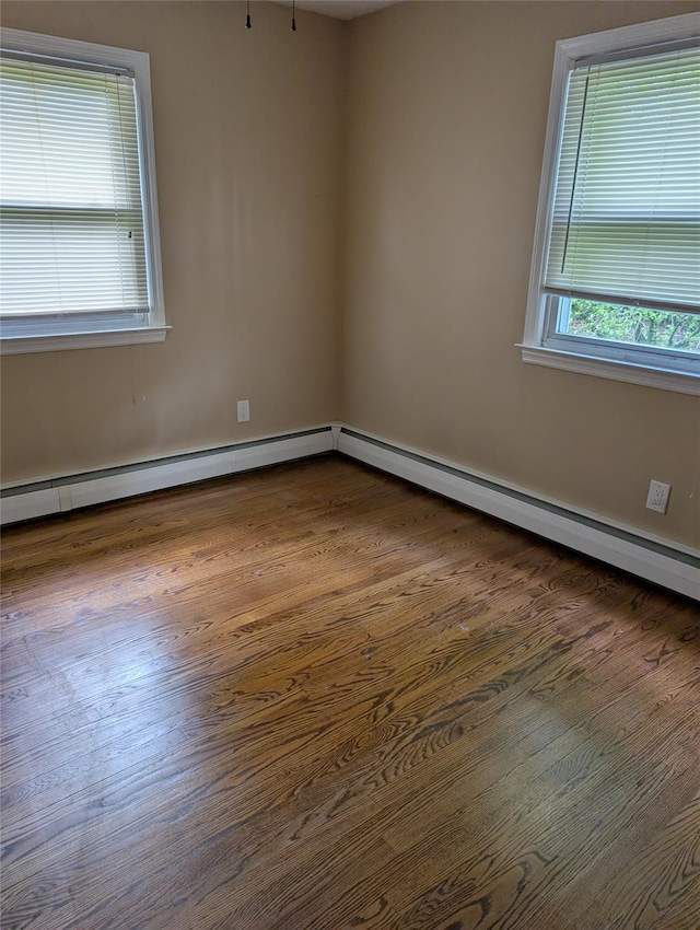 7 Sunset Dr, Yorktown Heights, NY 10598 - spare room featuring dark wood finished floors, a baseboard radiator, and baseboards