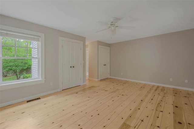 11 The Pkwy, Southampton, NY 11968 - empty room with light wood-style flooring, a ceiling fan, and baseboards