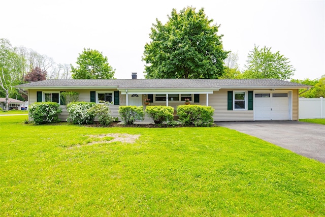 2 Princeton St, Red Hook, NY 12571 - single story home with a garage, asphalt driveway, and a chimney