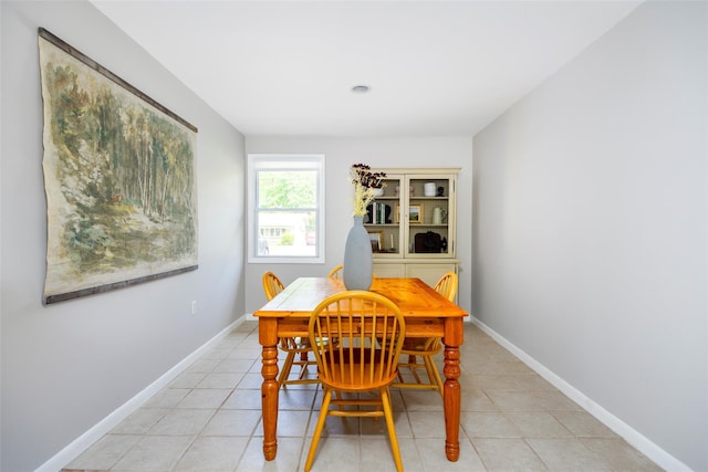 2 Princeton St, Red Hook, NY 12571 - dining space featuring light tile patterned flooring and baseboards