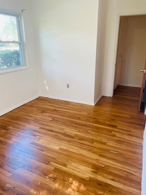82 Demarest Ave Unit 15, West Nyack, NY 10994 - unfurnished room with wood finished floors and baseboards