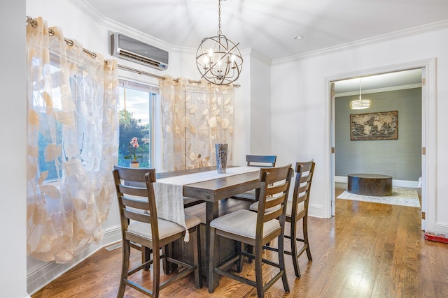 1 3rd Pl, Bellmore, NY 11710 - dining room featuring a wall mounted AC, wood finished floors, crown molding, a chandelier, and baseboards