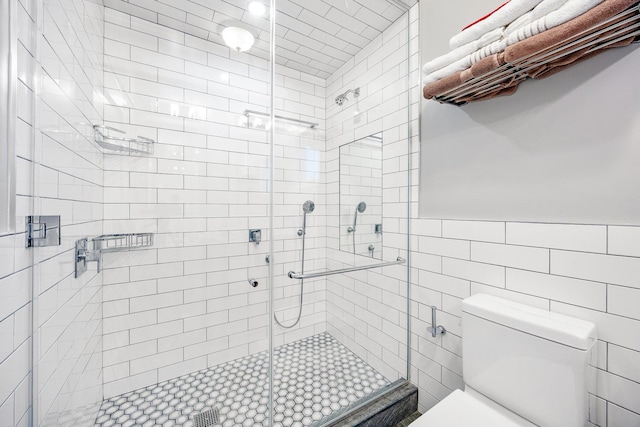 1 3rd Pl, Bellmore, NY 11710 - full bath with toilet, a shower stall, and tile walls