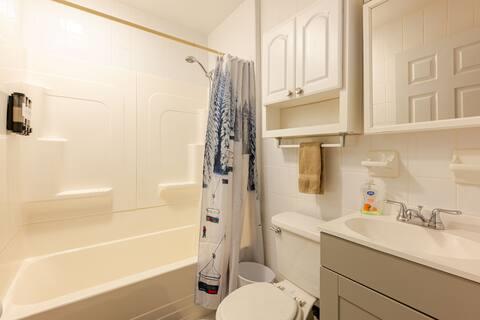 76 Highlands Dr Unit C2, Hunter, NY 12442 - full bathroom with vanity and shower / bath combo with shower curtain