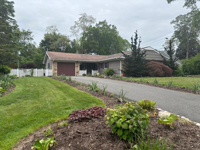 14 Sanford Ln, Stony Brook, NY 11790 - single story home featuring an attached garage and driveway