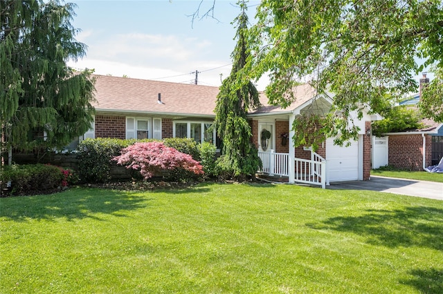 745 Willow Rd, Franklin Square, NY 11010 - ranch-style home with asphalt driveway, brick siding, a front yard, and a shingled roof