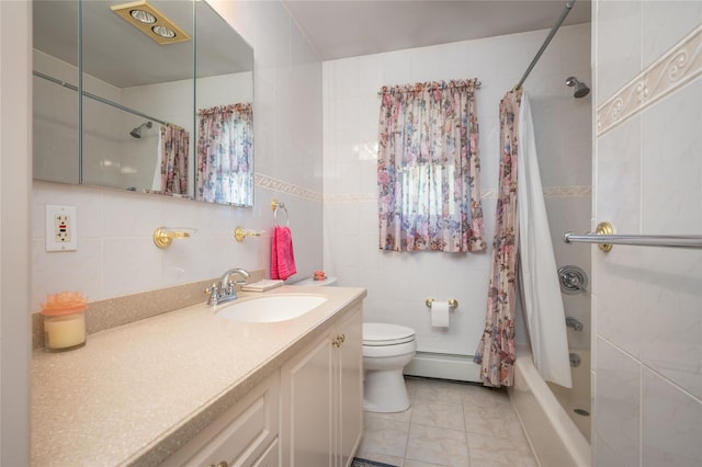 745 Willow Rd, Franklin Square, NY 11010 - full bathroom featuring tile walls, vanity, toilet, a baseboard radiator, and shower / bath combo with shower curtain