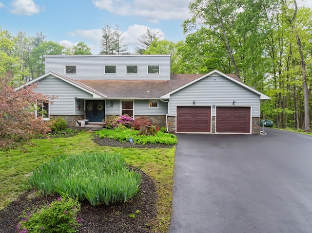 162 Forest Hill Dr, Kingston, NY 12401 - view of front of property with stone siding, a garage, and driveway