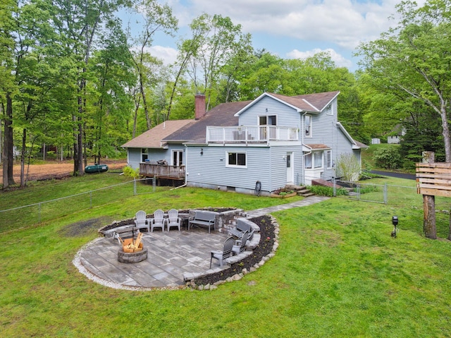 162 Forest Hill Dr, Kingston, NY 12401 - back of house featuring a fire pit, a chimney, a patio, a balcony, and a deck
