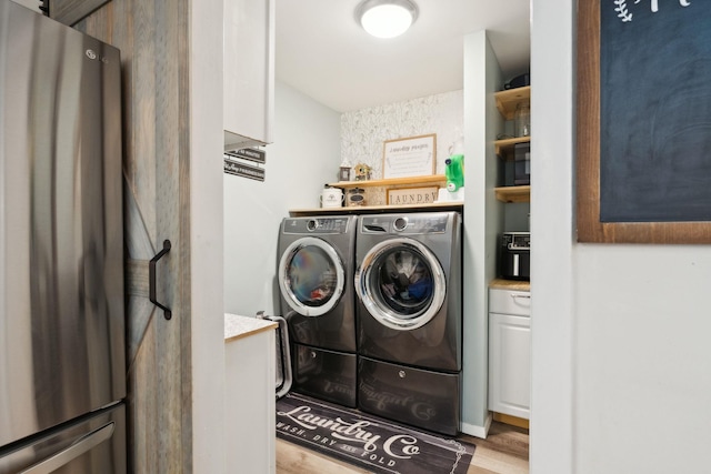 162 Forest Hill Dr, Kingston, NY 12401 - laundry area featuring washer and dryer and light wood-style floors