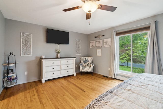 162 Forest Hill Dr, Kingston, NY 12401 - bedroom featuring light wood-style floors, multiple windows, and a ceiling fan