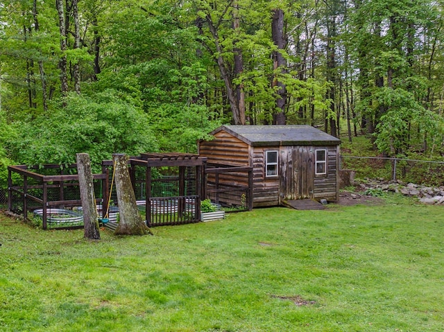162 Forest Hill Dr, Kingston, NY 12401 - view of yard featuring a wooded view, a storage unit, and an outdoor structure