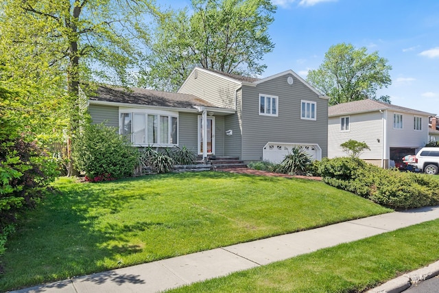 105 Farmers Ave, Plainview, NY 11803 - split level home featuring a garage and a front lawn