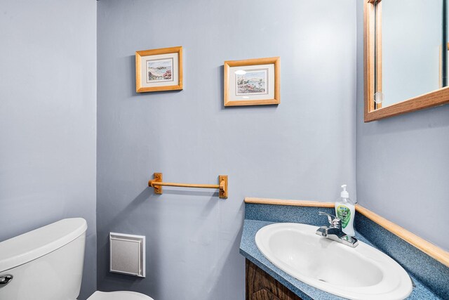 105 Farmers Ave, Plainview, NY 11803 - half bathroom with toilet and vanity