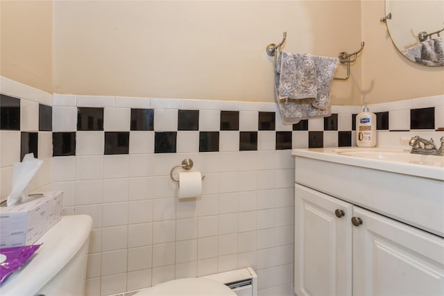 161 W Walnut St, Long Beach, NY 11561 - bathroom with tile walls, toilet, and vanity