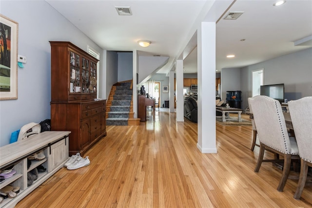 161 W Walnut St, Long Beach, NY 11561 - foyer entrance featuring stairway, light wood finished floors, and recessed lighting