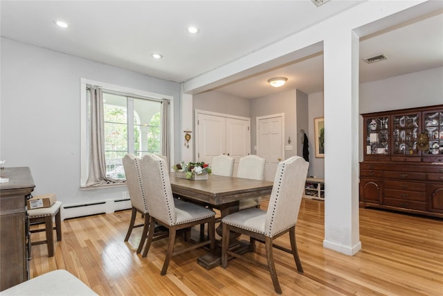161 W Walnut St, Long Beach, NY 11561 - dining room with a baseboard radiator, light wood-style flooring, and recessed lighting