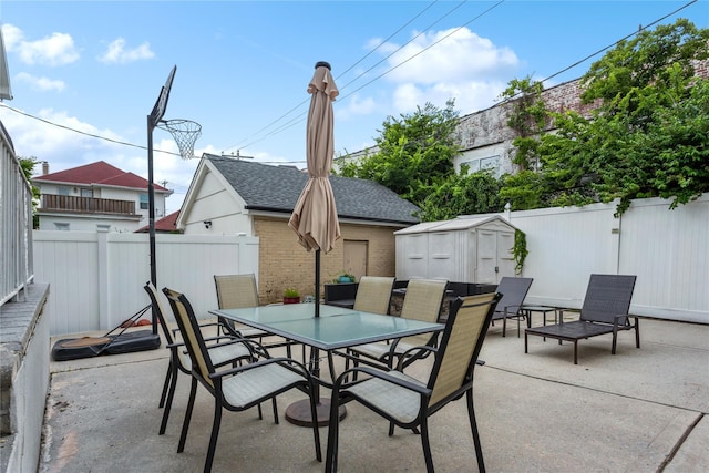 161 W Walnut St, Long Beach, NY 11561 - fenced backyard with outdoor dining space and a patio area