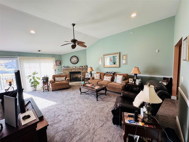211 Pond Cir, Mount Sinai, NY 11766 - living room featuring carpet flooring, lofted ceiling, a ceiling fan, a fireplace, and recessed lighting