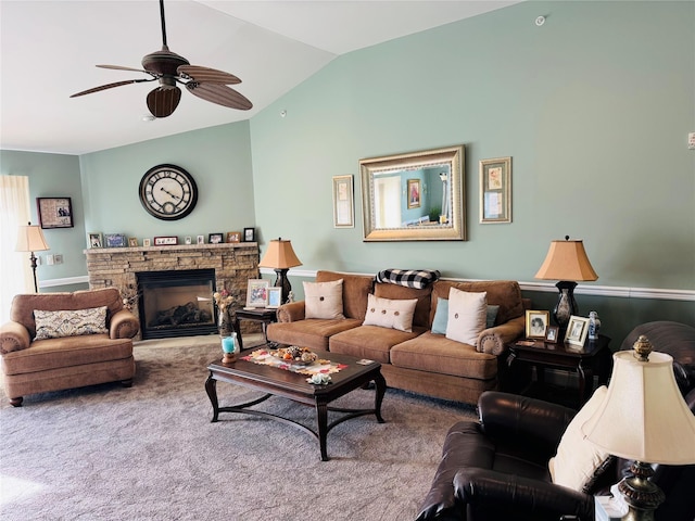 211 Pond Cir, Mount Sinai, NY 11766 - carpeted living room featuring vaulted ceiling, ceiling fan, and a fireplace