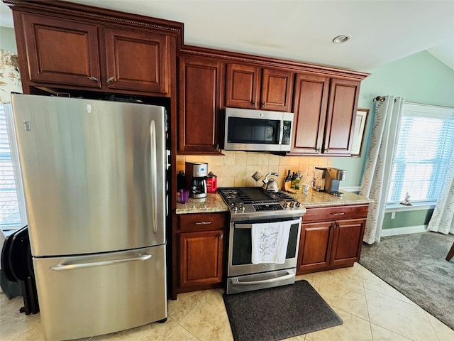 211 Pond Cir, Mount Sinai, NY 11766 - kitchen featuring stainless steel appliances, tasteful backsplash, baseboards, light stone counters, and recessed lighting