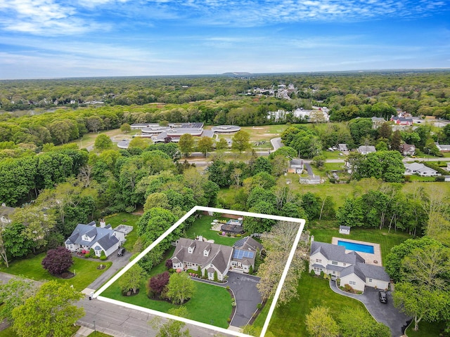 8 Emerald Ct, Moriches, NY 11955 - aerial view of residential area featuring property parcel outlined and a heavily wooded area
