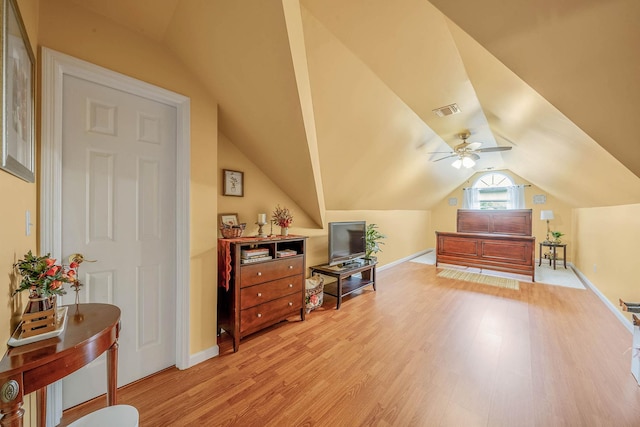 8 Emerald Ct, Moriches, NY 11955 - bedroom featuring light wood-style floors, lofted ceiling, and baseboards