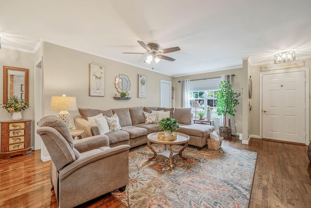 8 Emerald Ct, Moriches, NY 11955 - living room with wood finished floors, ceiling fan, crown molding, and baseboards