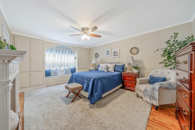8 Emerald Ct, Moriches, NY 11955 - bedroom with ornamental molding, light wood-style floors, and a ceiling fan