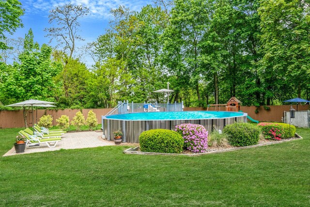 8 Emerald Ct, Moriches, NY 11955 - view of yard with a patio area