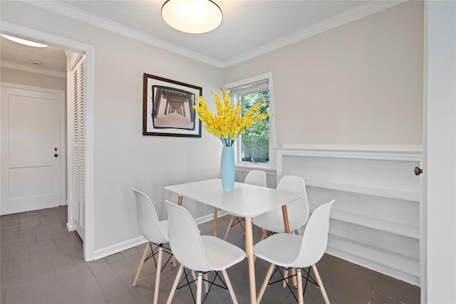 55 W End Ave, East Quogue, NY 11942 - dining area featuring built in features, crown molding, and baseboards