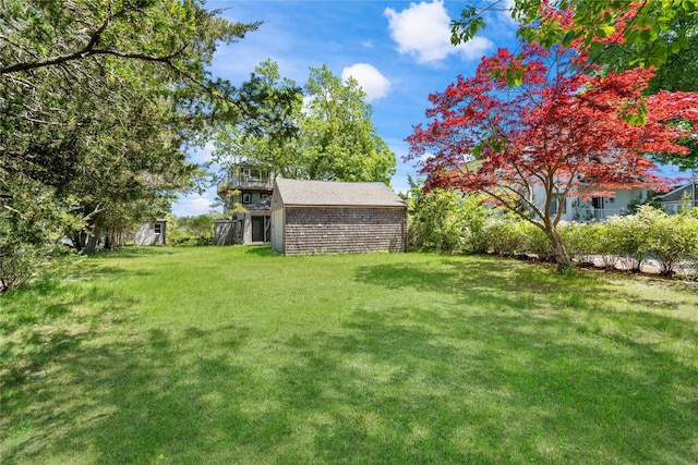 55 W End Ave, East Quogue, NY 11942 - view of green lawn with an outdoor structure