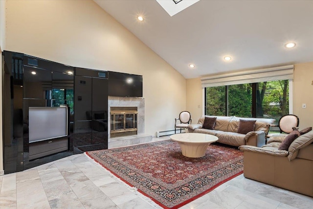 29 Sunset Rd S, Albertson, NY 11507 - living area with high vaulted ceiling, a baseboard heating unit, a fireplace, recessed lighting, and a skylight