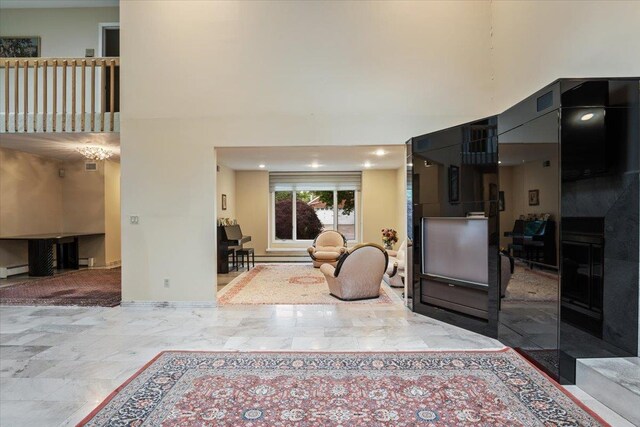 29 Sunset Rd S, Albertson, NY 11507 - living area with a towering ceiling