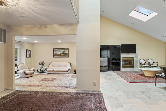 29 Sunset Rd S, Albertson, NY 11507 - living room with a skylight, a premium fireplace, recessed lighting, and lofted ceiling