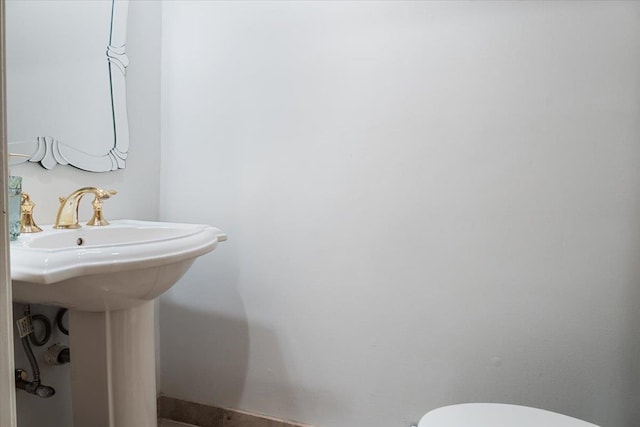 29 Sunset Rd S, Albertson, NY 11507 - bathroom with a sink and toilet