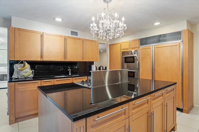 29 Sunset Rd S, Albertson, NY 11507 - kitchen with a sink, light tile patterned floors, a chandelier, double oven, and recessed lighting