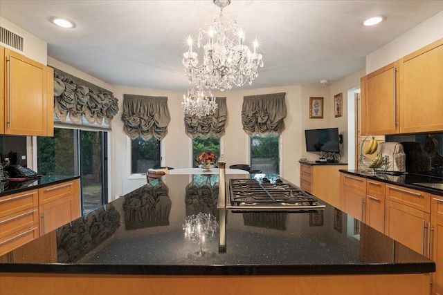 29 Sunset Rd S, Albertson, NY 11507 - kitchen featuring a chandelier, stainless steel gas cooktop, a large island, recessed lighting, and dark stone countertops