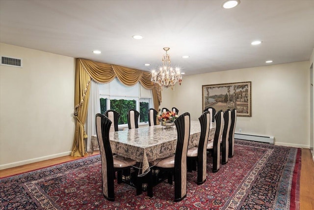 29 Sunset Rd S, Albertson, NY 11507 - dining space featuring wood finished floors, a baseboard heating unit, recessed lighting, a chandelier, and baseboards