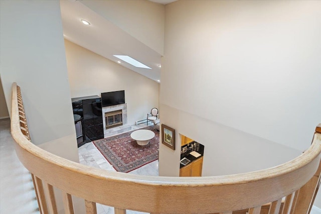 29 Sunset Rd S, Albertson, NY 11507 - stairway with a skylight, a fireplace, recessed lighting, and vaulted ceiling