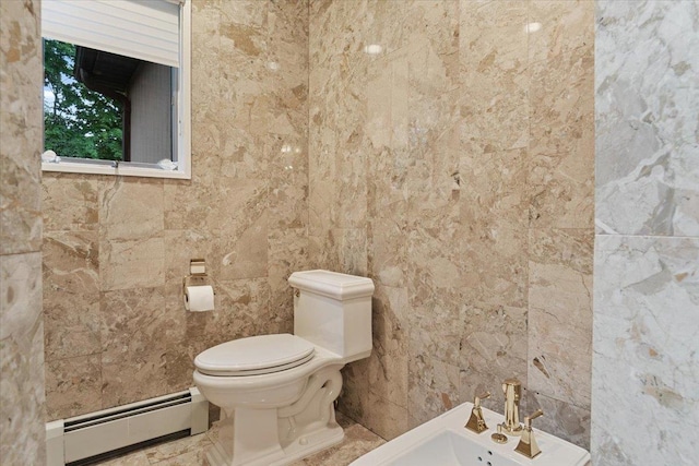 29 Sunset Rd S, Albertson, NY 11507 - bathroom with baseboard heating, tile walls, toilet, and a bidet