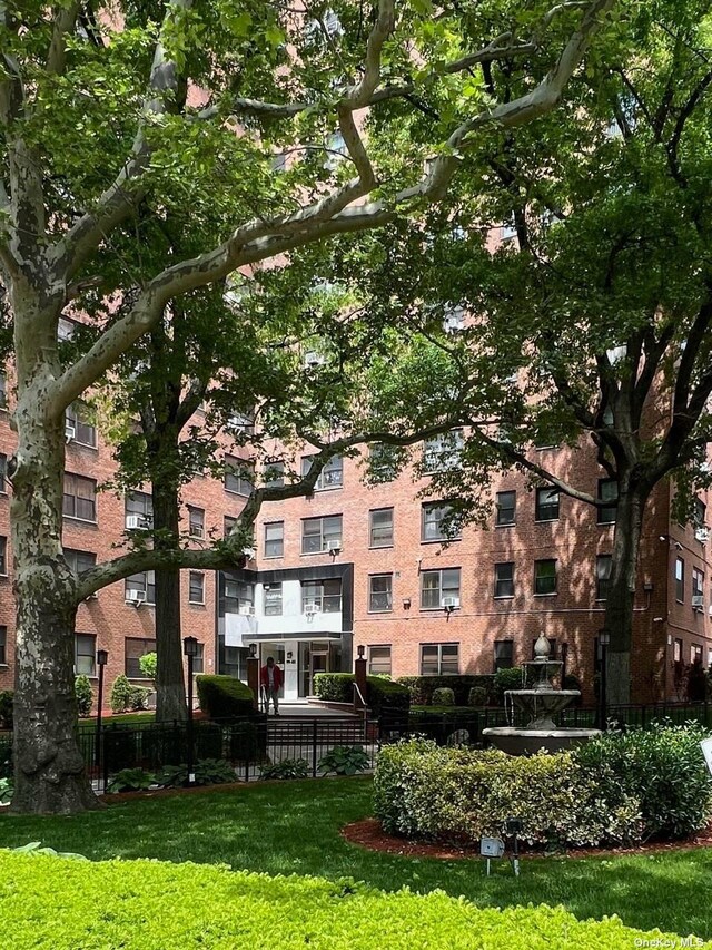 99-05 63rd Dr Unit 14R, Rego Park, NY 11374 - view of apartment building / complex