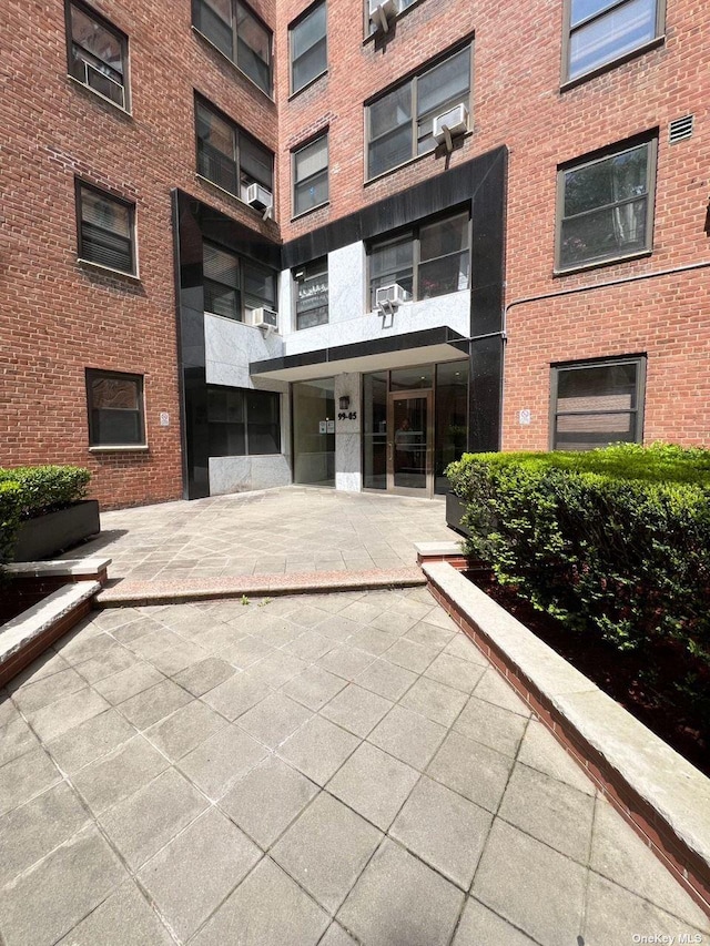 99-05 63rd Dr Unit 14R, Rego Park, NY 11374 - view of apartment building / complex