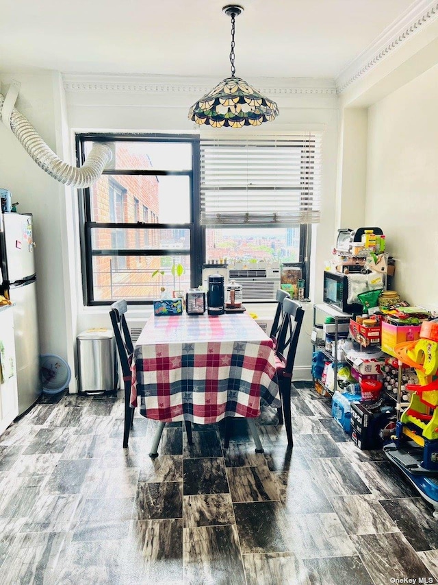 99-05 63rd Dr Unit 14R, Rego Park, NY 11374 - dining room featuring crown molding