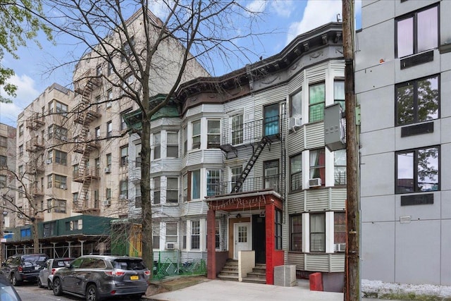 view of apartment building / complex featuring cooling unit